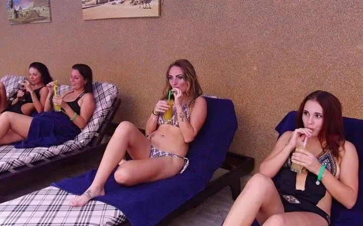 Women relaxing with drinks at a Turkish spa in Sharm el-Sheikh.