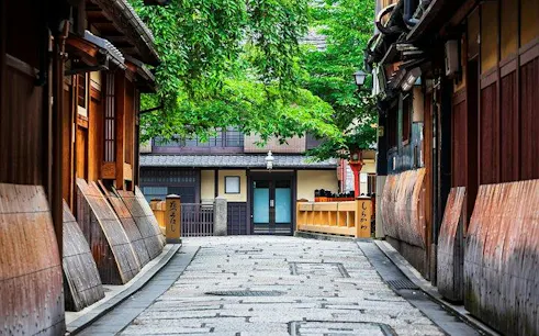 Gion district street with traditional wooden buildings, Kyoto.