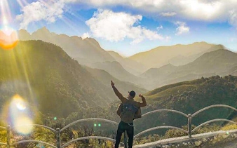 Traveler enjoying mountain view at Silver Waterfall, Heaven Gate, Vietnam.