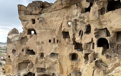 Cappadocia rock-cut dwellings on private museum tour with guide.