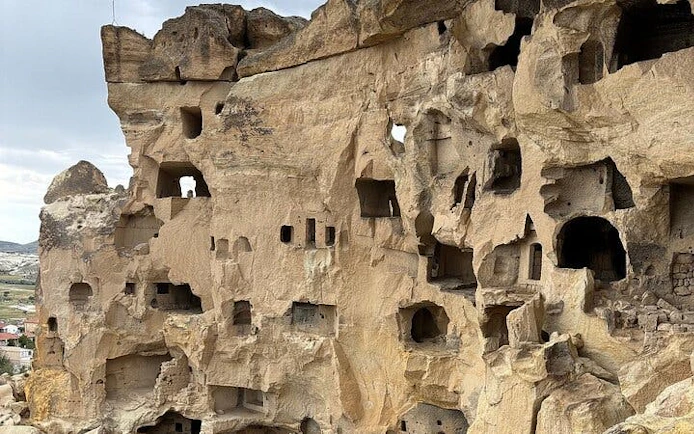 Cappadocia rock-cut dwellings on private museum tour with guide.