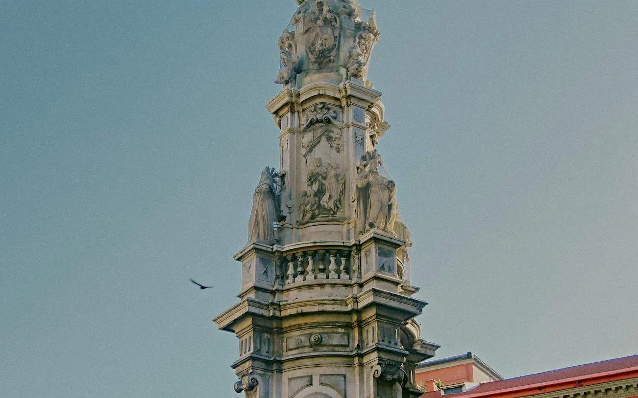 Baroque obelisk with sculptures in Naples Historic Center, Italy.