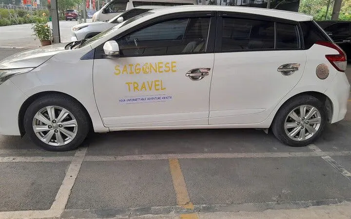 Private transfer vehicle for Sapa to Mai Châu service parked in a lot.
