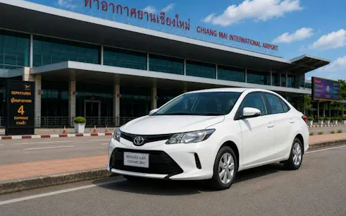 Private car parked outside Chiang Mai International Airport for hotel transfer service.