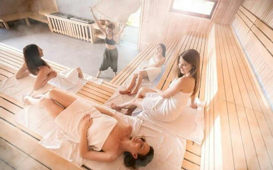 Women relaxing in a traditional Moroccan hammam in Marrakesh.