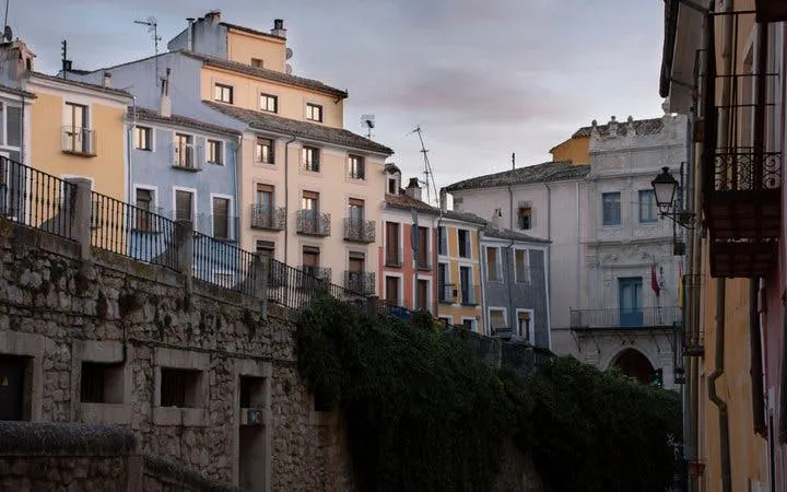 Colorful historic buildings in Cuenca, Spain, viewed during a self-guided walking tour.