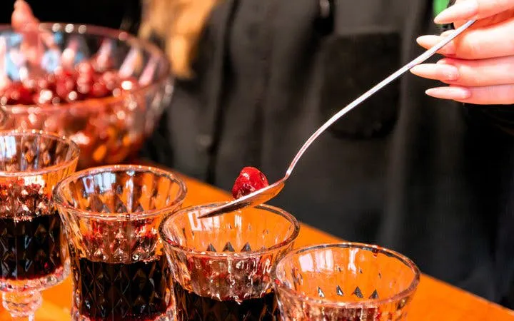 Cherry dessert preparation during Bratislava Slovak food tour.