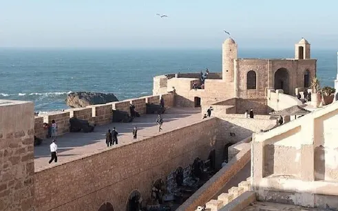 Essaouira city walls overlooking the Atlantic Ocean, part of Marrakesh day tour.