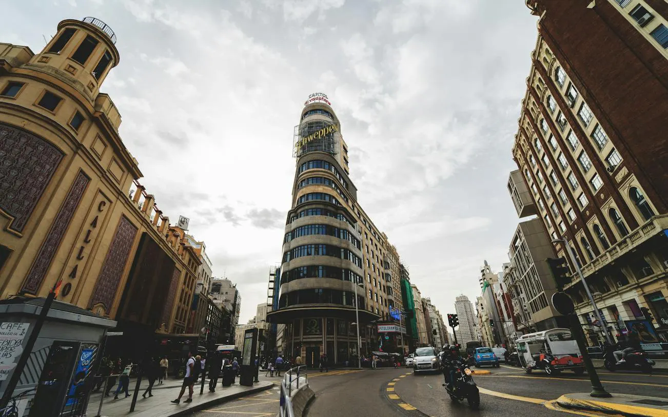 Gran Vía street view with Capitol Building and Callao cinema, Madrid.