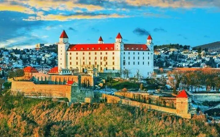 Bratislava Castle with red rooftops overlooking the city, Slovakia.