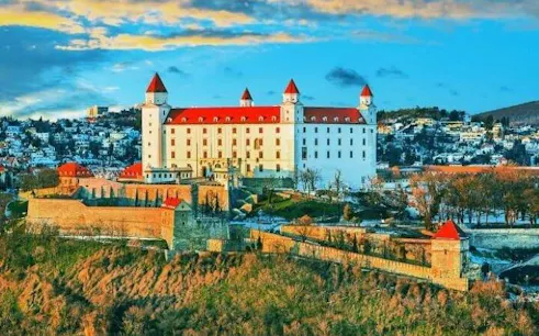 Bratislava Castle with red rooftops overlooking the city, Slovakia.