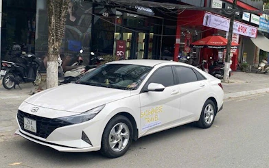 Private car parked on city street for flexible half-day museum tour rental.