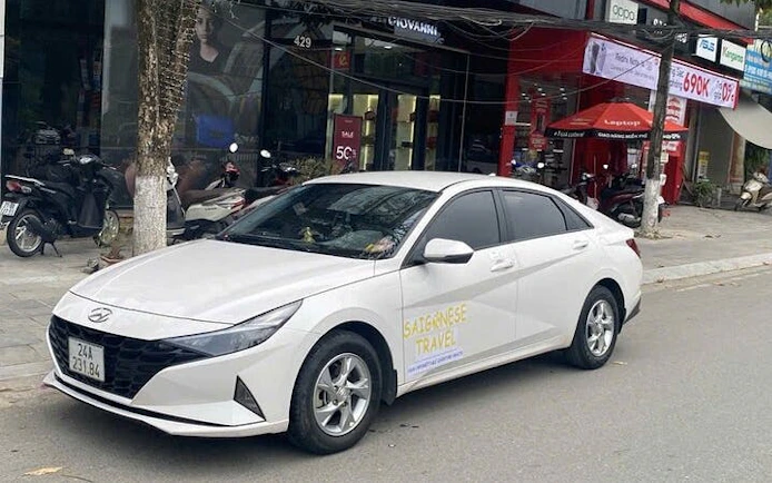 Private car parked on city street for flexible half-day museum tour rental.