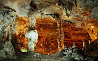 Cave interior with stalactites and stalagmites on Sapa Trekking Tour, Ta Phin Village.