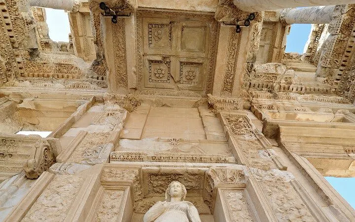 Ancient ruins of the Library of Celsus in Ephesus, Turkey, viewed from below.