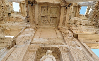 Ancient ruins of the Library of Celsus in Ephesus, Turkey, viewed from below.