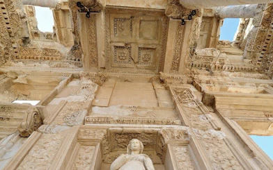 Ancient ruins of the Library of Celsus in Ephesus, Turkey, viewed from below.