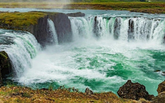 Waterfall in Iceland featured on self-guided walking tour mobile app.
