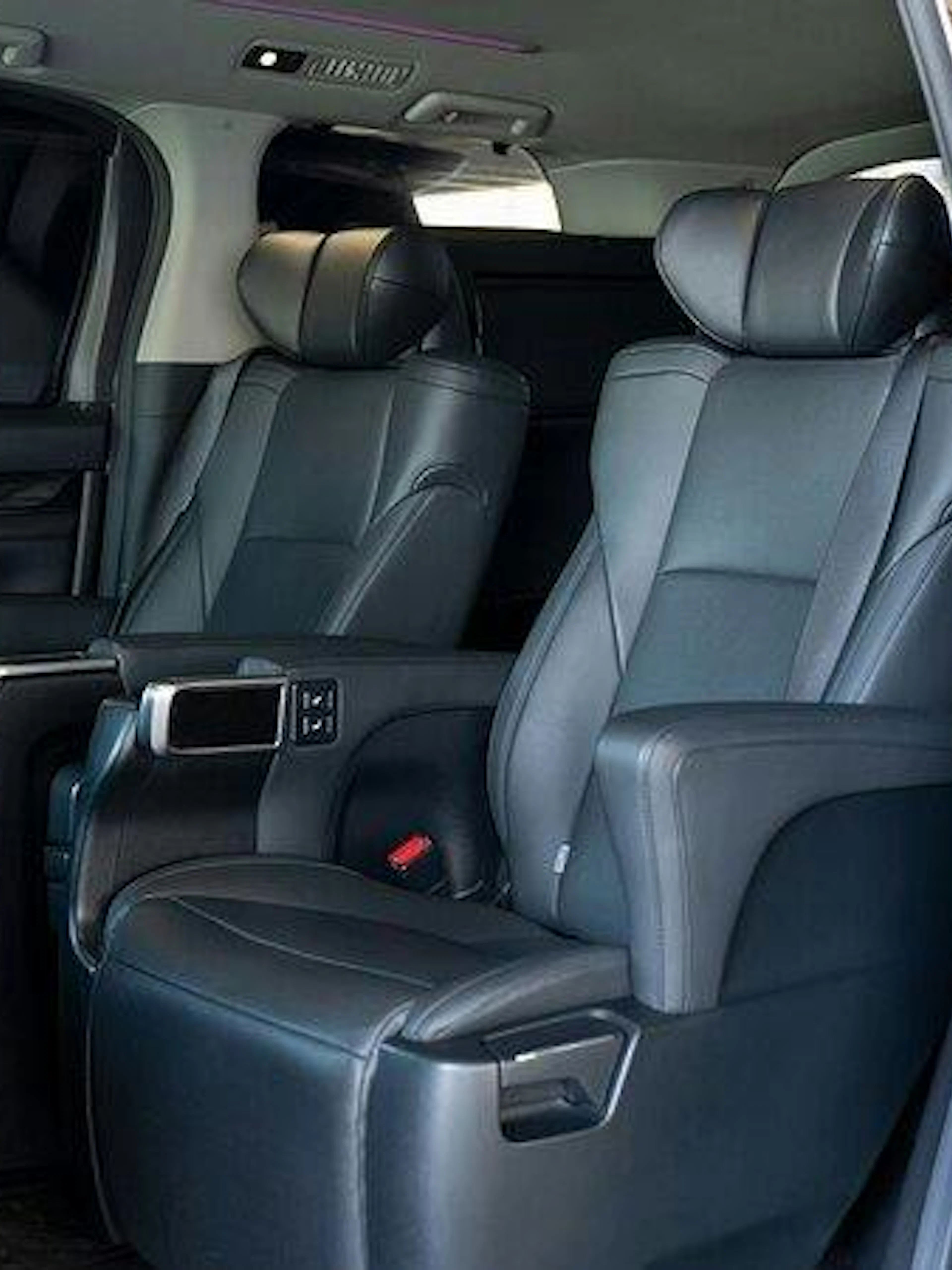 Luxury interior of private transfer vehicle for Osaka City to Kansai Airport (KIX).