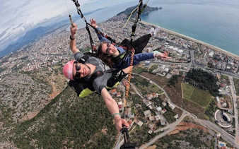 tandem paragliding with a licensed pilot from side-10