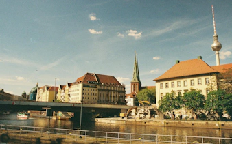 Berlin's Nikolaiviertel with Red Town Hall and TV Tower in the background.