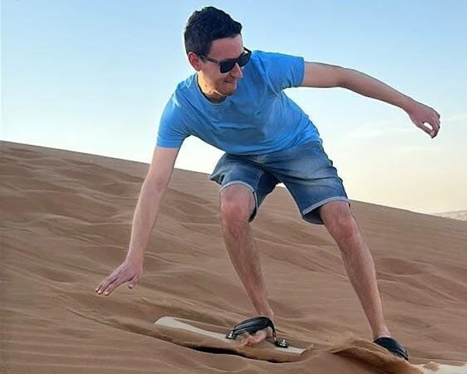 Dubai Evening Desert Safari with Dune Bashing, Camel Ride, Sandboarding, Live Shows & BBQ Dinner (Product 53155)