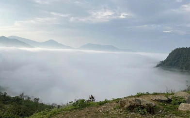 Fog-covered mountains in Sapa during a guided motorbike tour of Ta Phin, Ngu Chi Son, and Ban Khoang villages.