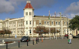 Historic Adelaide building with tower on self-guided audio tour route.