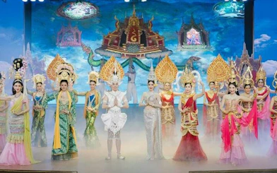 Performers in traditional costumes on stage at Golden Dome Cabaret, Bangkok.