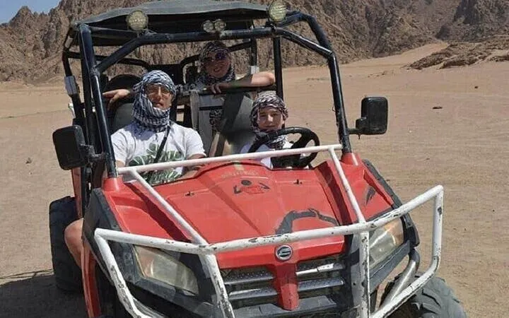 Buggy ride through desert landscape in Palmeraie, Marrakesh.