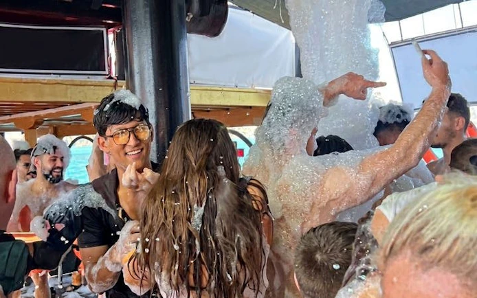 Pirate-themed boat cruise foam party with DJ in Antalya.