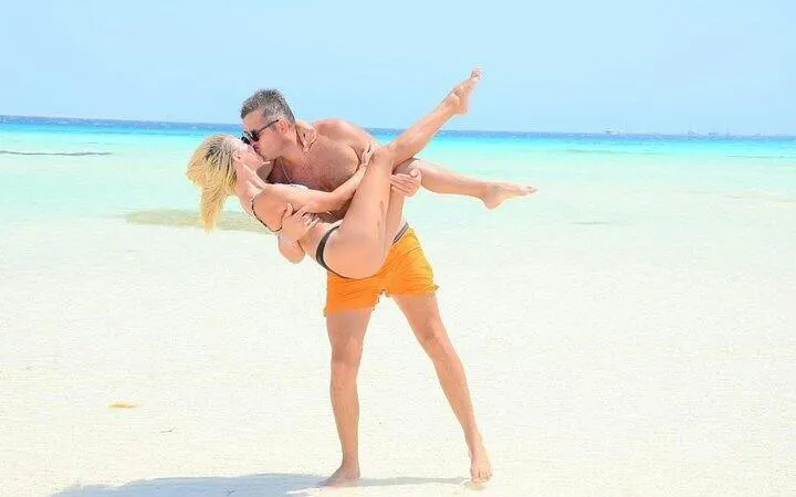 Couple enjoying beach at Ras Mohamed, Sharm el-Sheikh.
