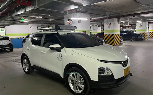 Private car in parking garage for Sapa to Ha Noi transfer service.
