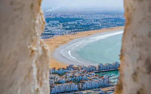 Agadir cityscape with beach view from a high vantage point, Morocco.
