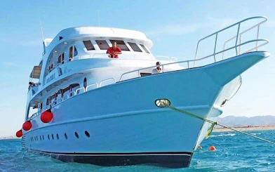 Scuba diving boat anchored in Hurghada, Egypt, ready for a full-day beginner trip.