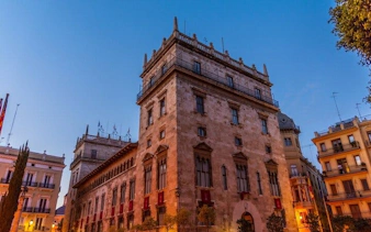 Gothic building in Barcelona at dusk, part of the Ghosts of Gothic Barcelona exploration game.