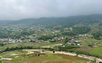 Sapa valley view with terraced fields and village, Vietnam.
