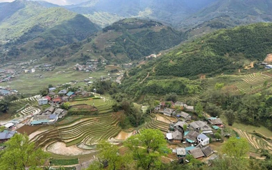 Sapa terraced rice fields and village view during guided trek, Vietnam.