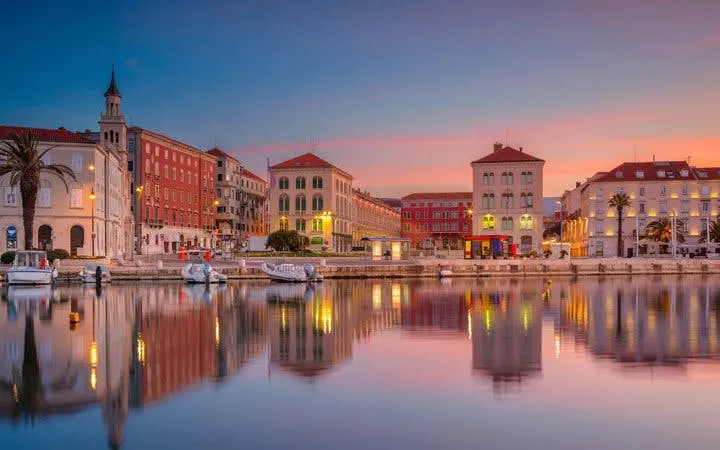 Split waterfront at sunset with historic buildings and boats, featured in self-guided walking tour app.