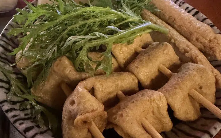 Korean street food skewers with greens, part of Seoul Chimaek Night Food Experience.