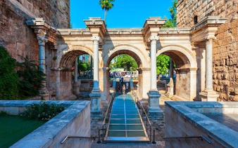 Hadrian's Gate in Antalya on a sunny day, part of a self-guided walking tour.