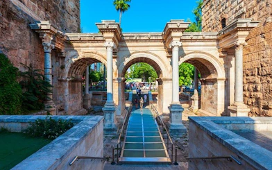 Hadrian's Gate in Antalya on a sunny day, part of a self-guided walking tour.