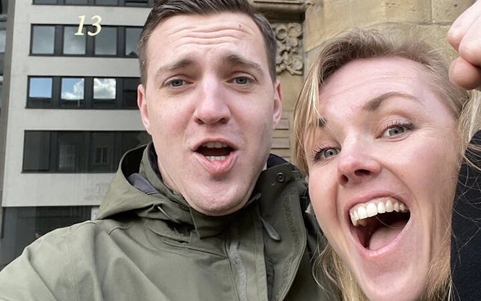 Couple enjoying Haunted Cologne self-guided city exploration game.