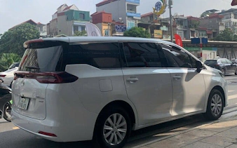 Private car parked on a city street for flexible half-day museum tours.