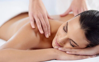 Person receiving a full-body massage during Turkish bath experience in Sharm El Sheikh.