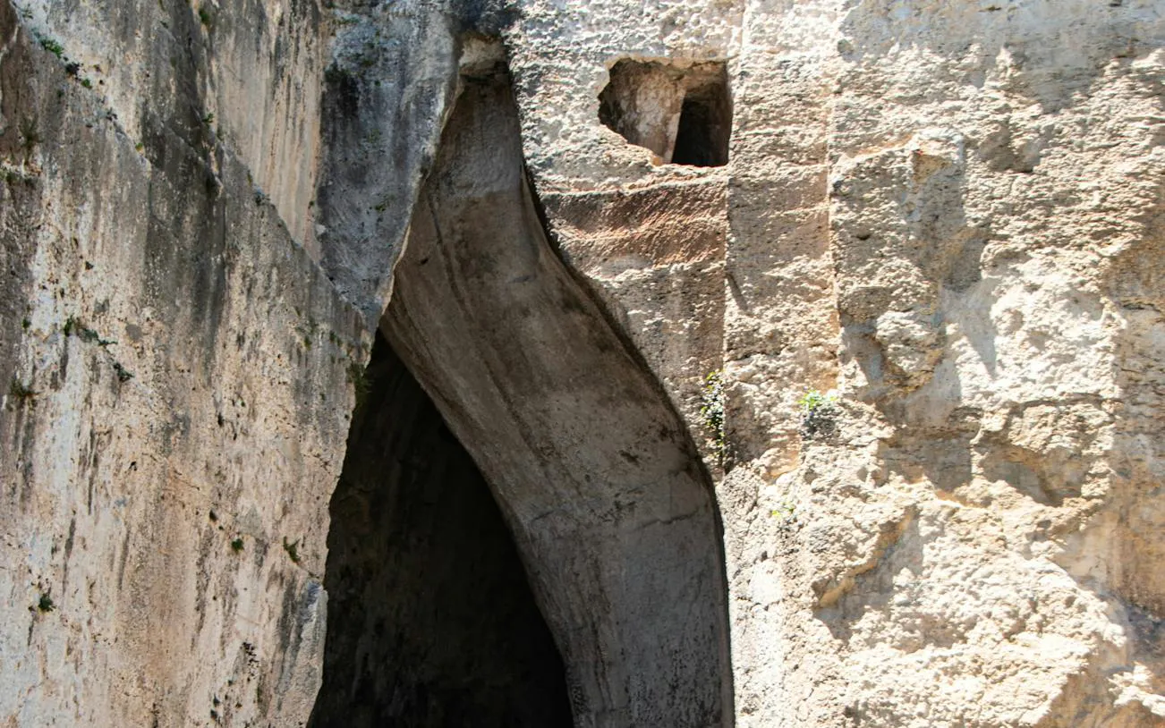 Ear of Dionysius cave entrance at Neapolis Archaeological Park, Siracusa.