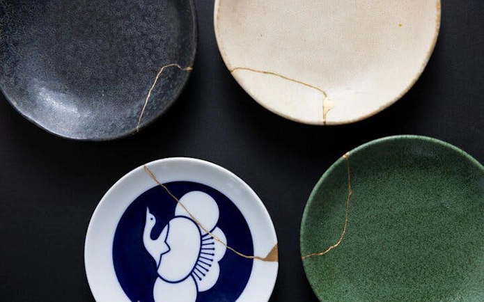 Repaired pottery with gold seams from Kintsugi workshop in Shibuya, Japan.