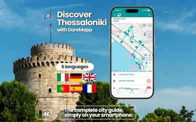 Thessaloniki White Tower with mobile app map for self-guided walking tour.
