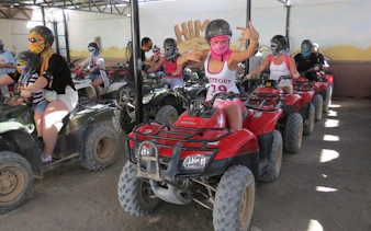 Quad bike riders preparing for safari adventure in Hurghada.