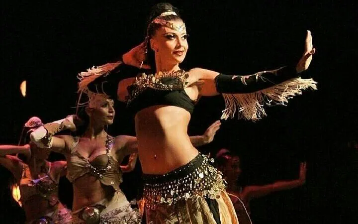 Cabaret dancers performing on stage during a night show in Hurghada.